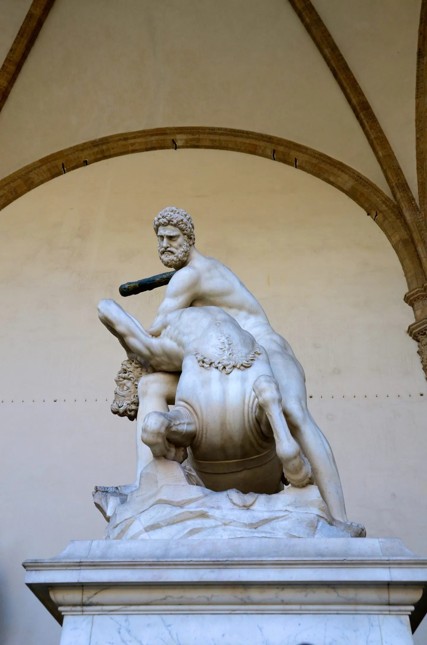 Taking a rest in front of the statue in piazza della signori a in Florence.