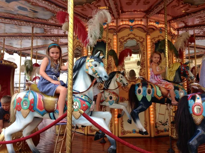 Taking a spin on the carousel in Florence.