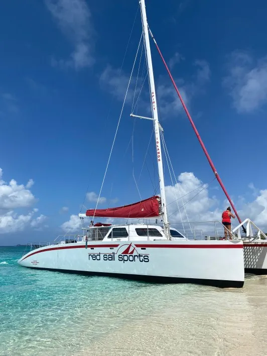 Red sail Sports Catamaran in Grand Cayman