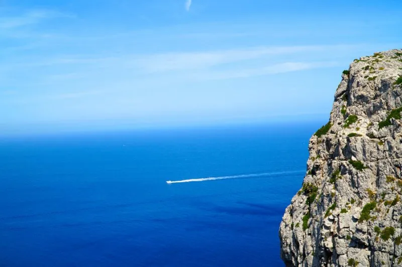 Boat in the Mediterranean sea on the drive to Cap de Formentor.