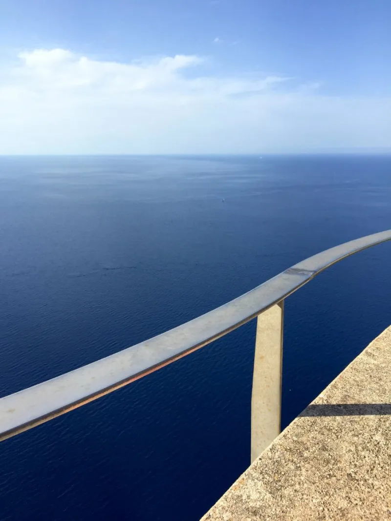 Looking out over the Mediterranean sea at the lighthouse on cap de Formentor