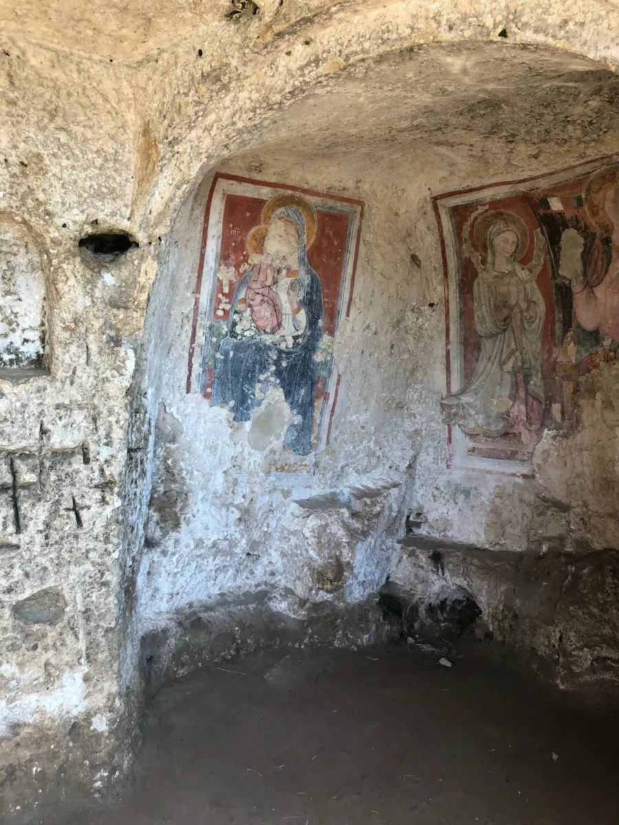 Things to do in Matera, look at the caves and frescoes in Murgia National Park