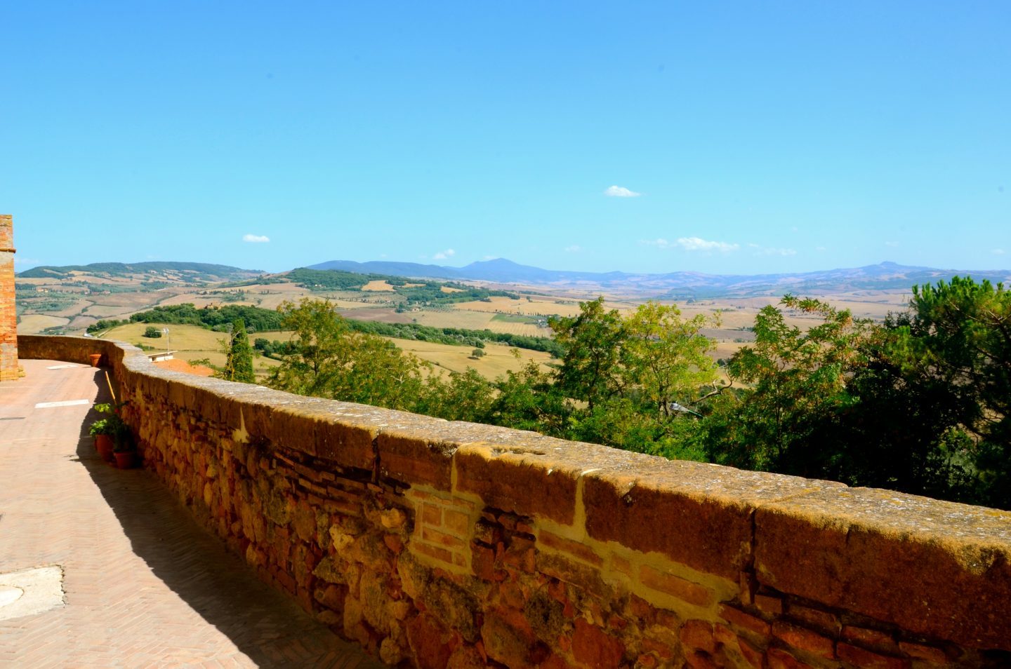 Walk on the path that circles around Pienza Tuscany.