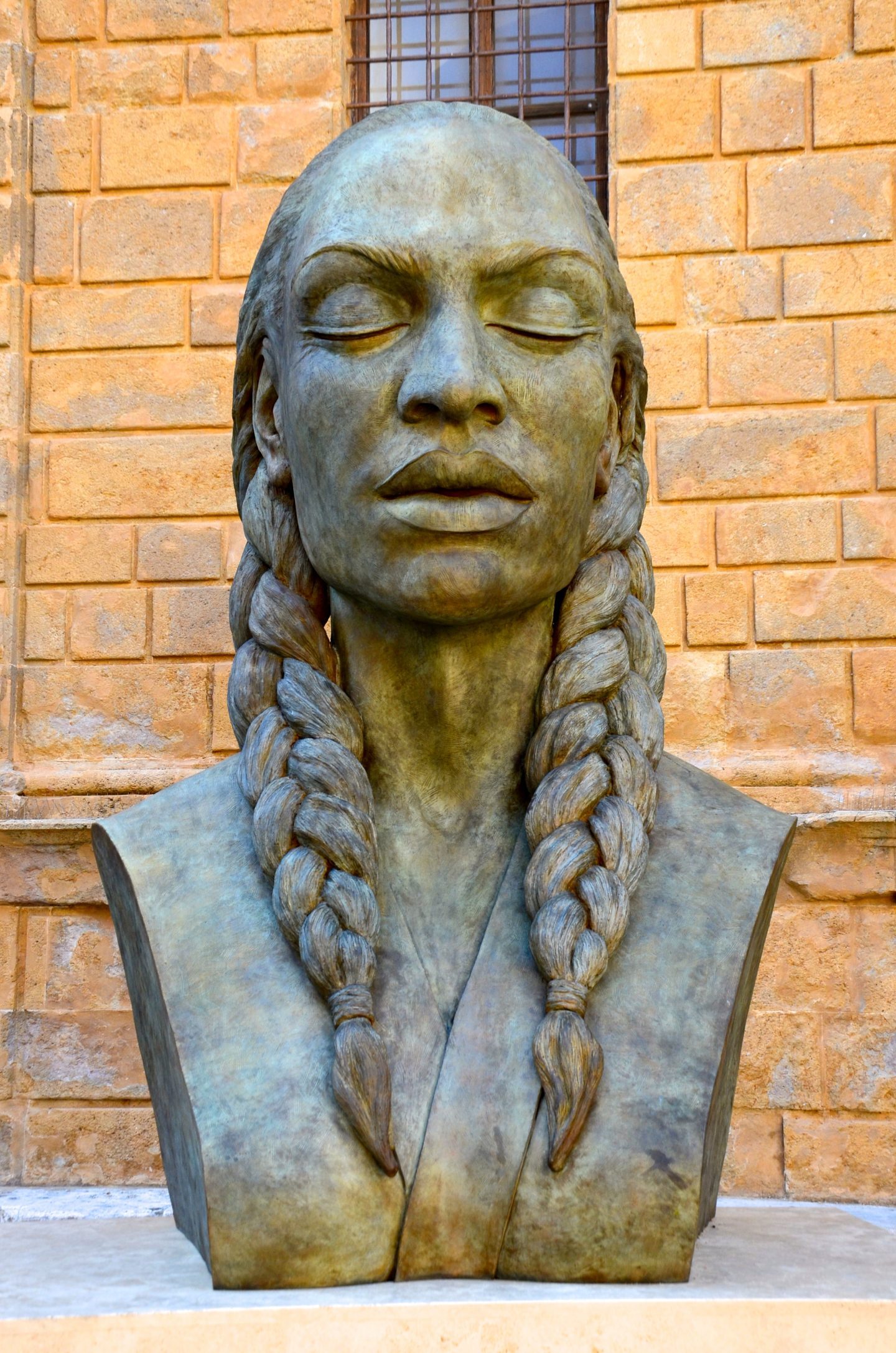 Large sculpture in the town square in Pienza Tuscany.