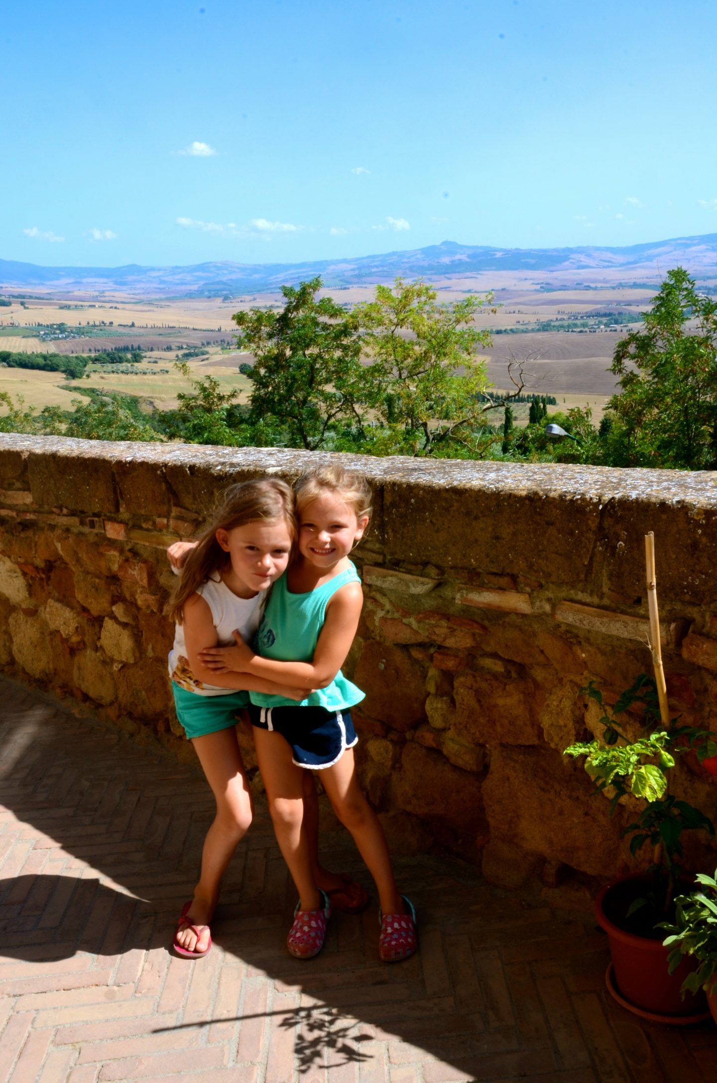 Girls with a view in Pienza Tuscany.