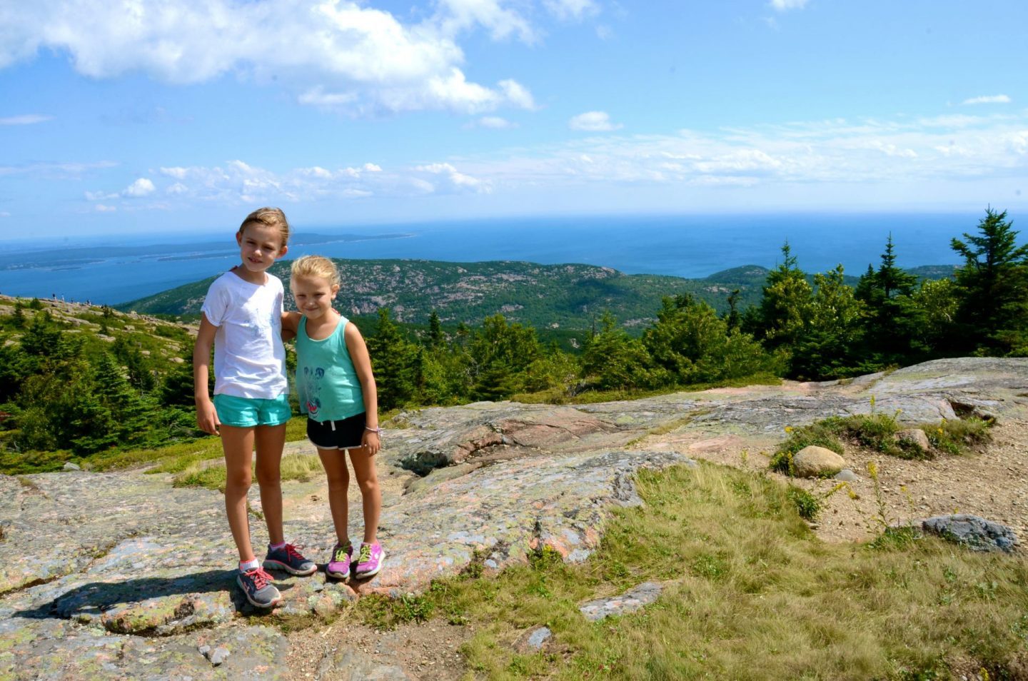 Acadia National Park with kids at the top of Cadillac Mountain