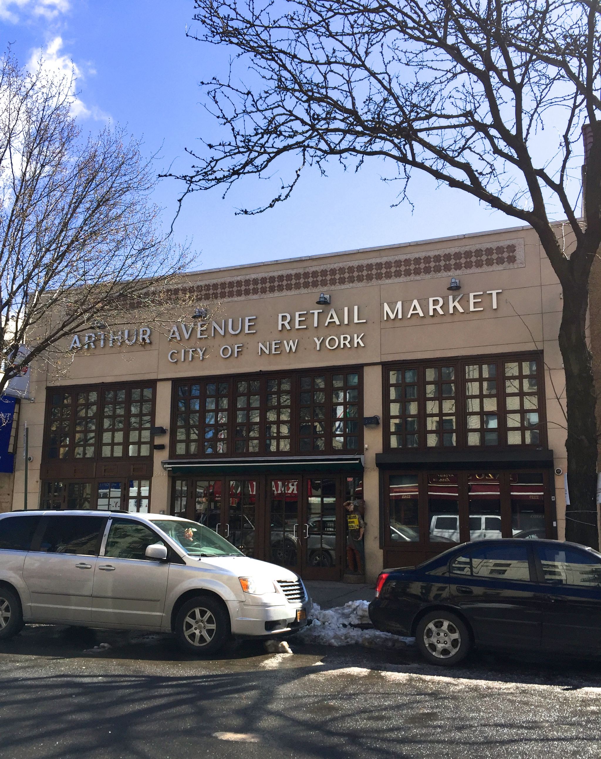 Walking in the Arthur Avenue Retail Market in the Bronx.