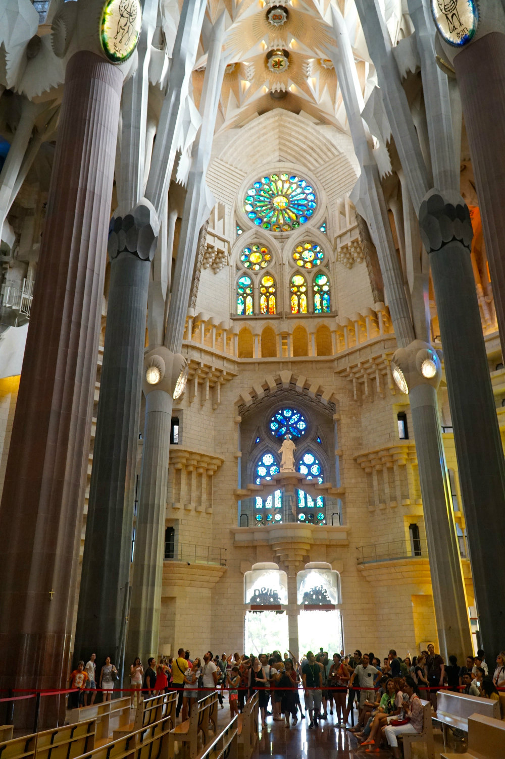 Walking inside of the Sagrada Familia by Gaudi in Barcelona.
