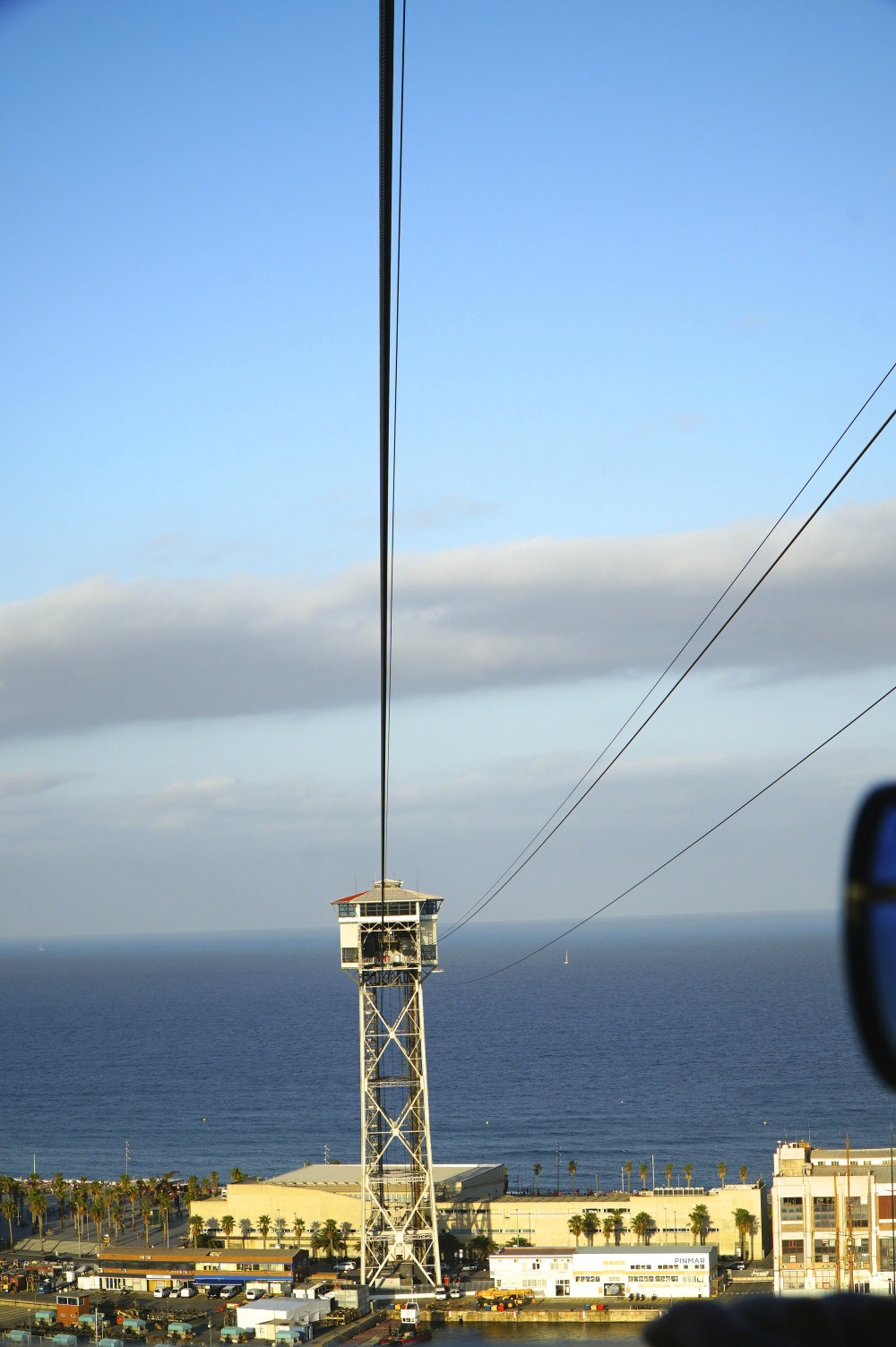 Taking a ride on the cable car in Barcelona with kids.
