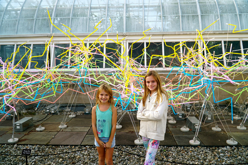 Having fun at the neon installation at the Chihuly exhibition at the New York Botanical Garden.