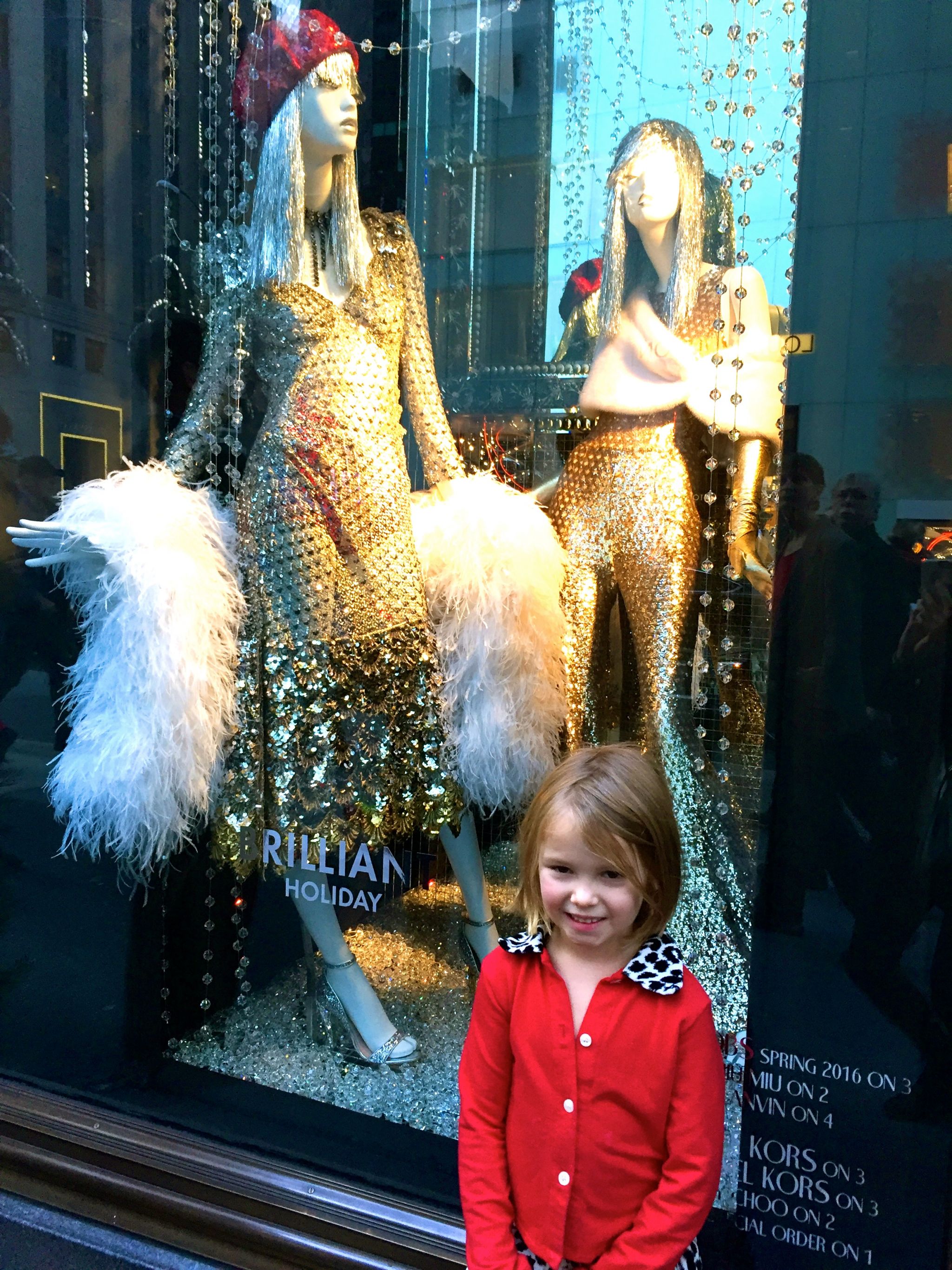 Viewing the Fifth Avenue store windows during Christmas in New York.