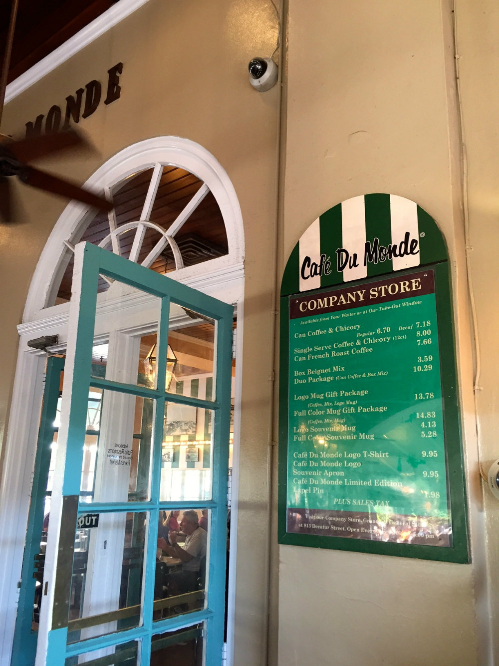 Eating beignets at Cafe du Monde in the French Quarter in New Orleans.