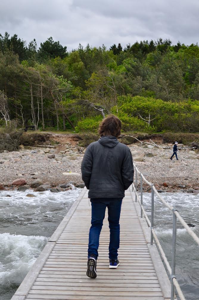 Walking on the dock on summer family vacation in Denmark north of Copenhagen.