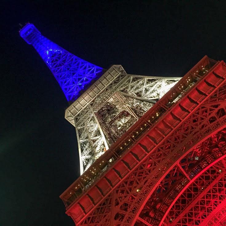 View of Eiffel Tower in Paris in red, white and blue.