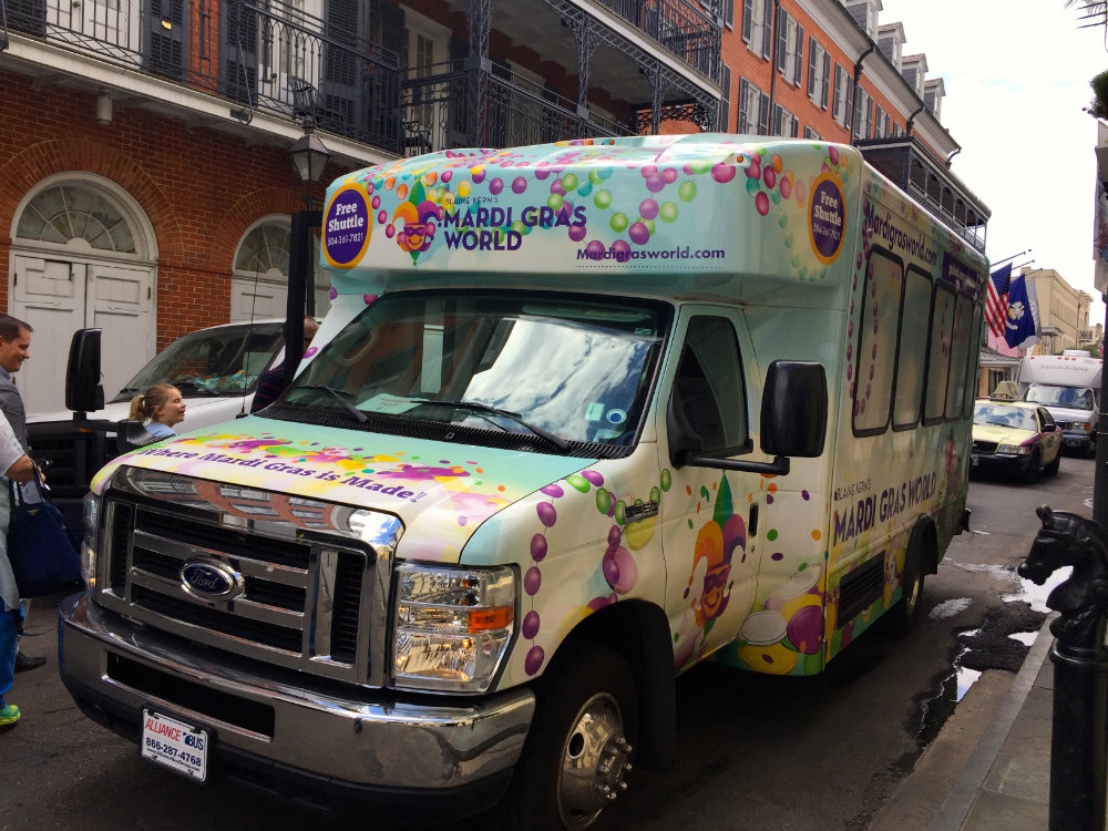 Hopping on the free shuttle provided by Mardi Gras World.