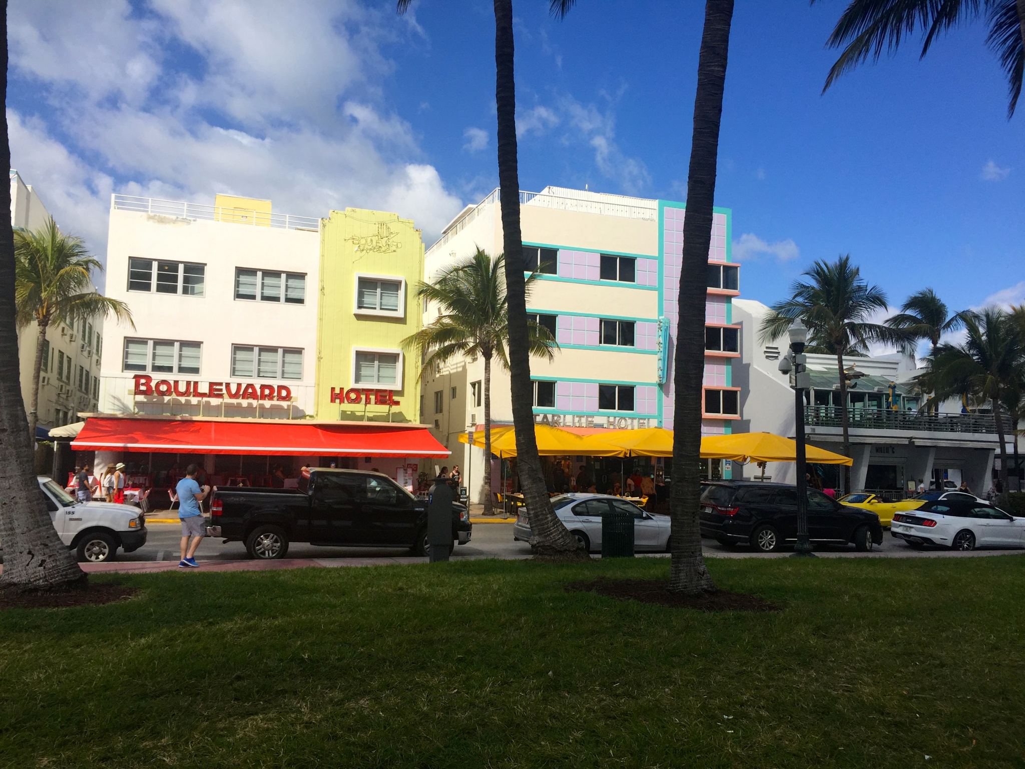 Viewing the art deco buildings in South Beach Miami from the boardwalk.
