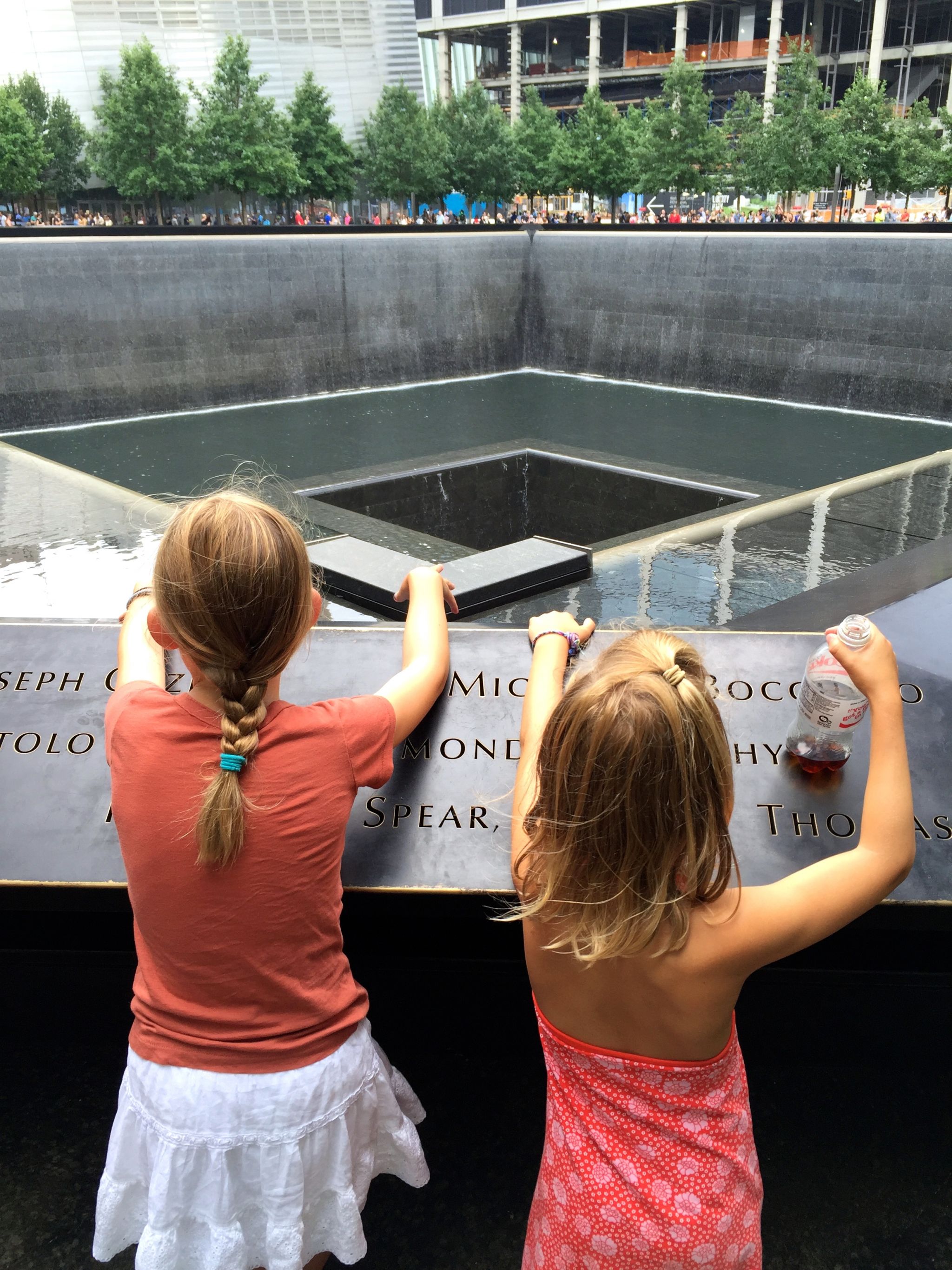 Memorial pools with Oculus in background.