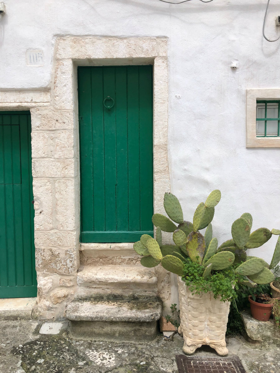 Green door in Ostuni Puglia Italy