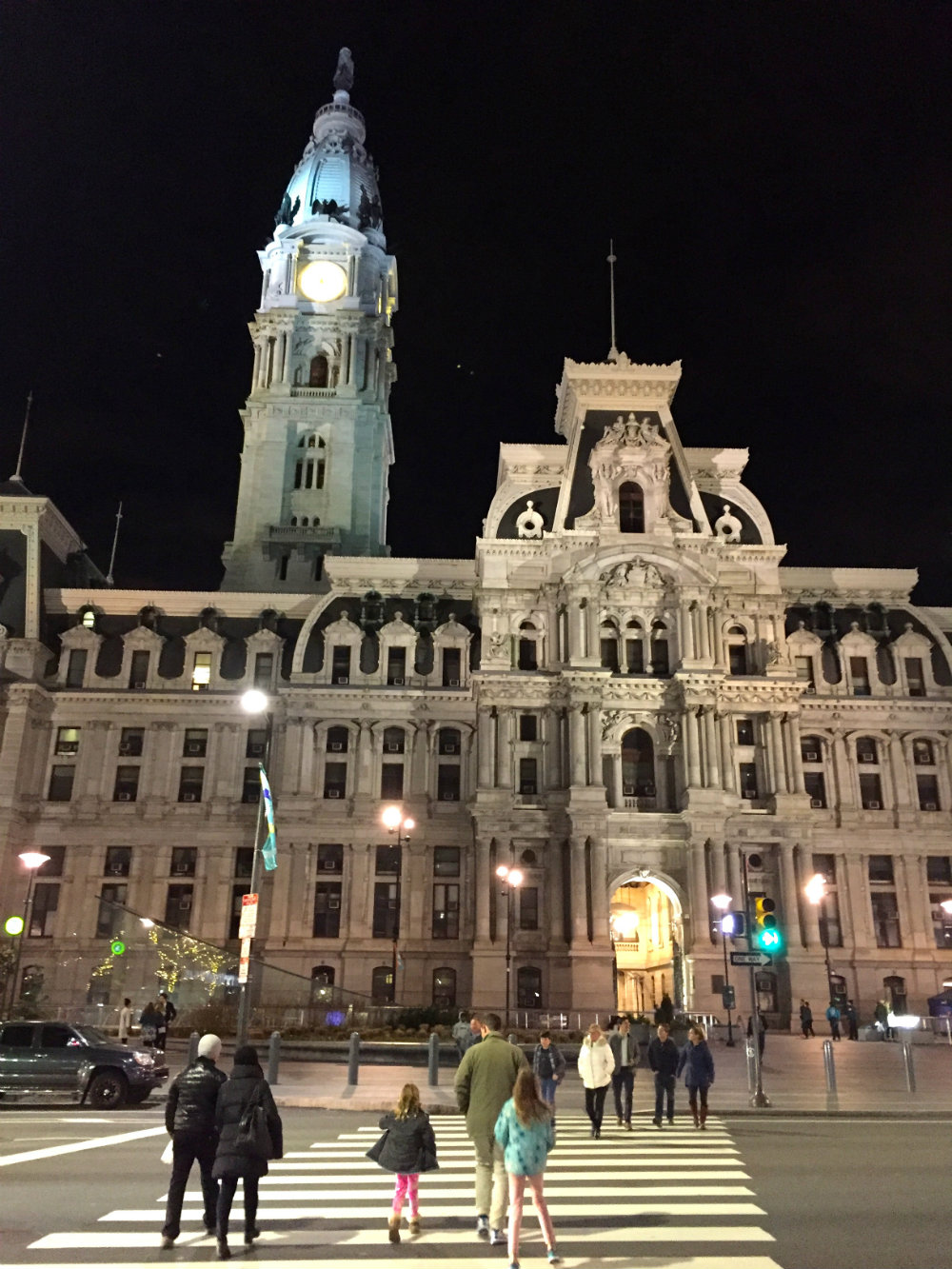 City Hall in Philadelphia by day and by night.