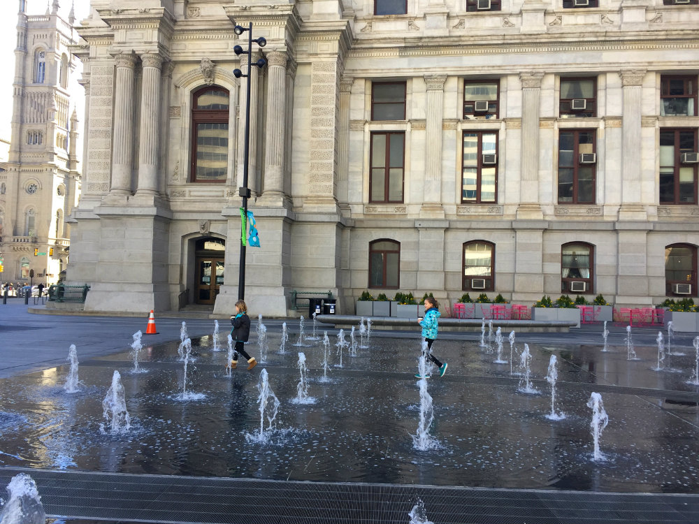 Things to do with kids in Philadelphia, exploring the fountain at City Hall in Philadelphia.