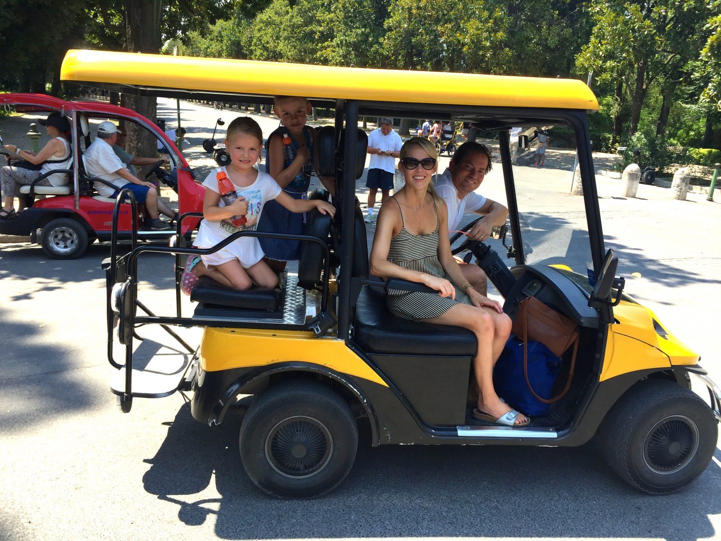 Cruising around Villa Borghese in Rome in golf carts.