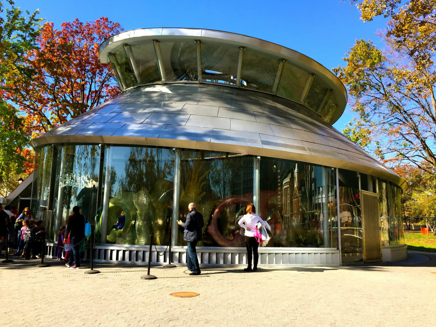 Outside of the building of the Seaglass carousel in Battery Park, New York City.