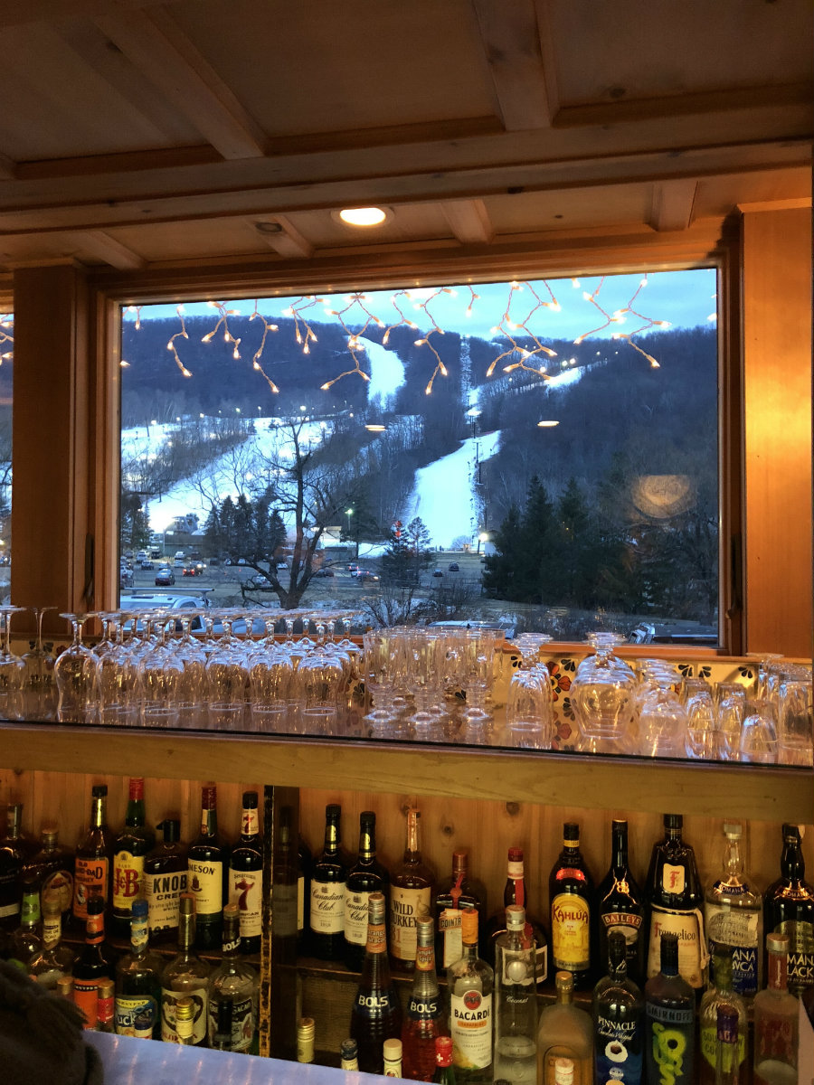 Looking out at the Catamount slopes at the Swiss Hutte bar