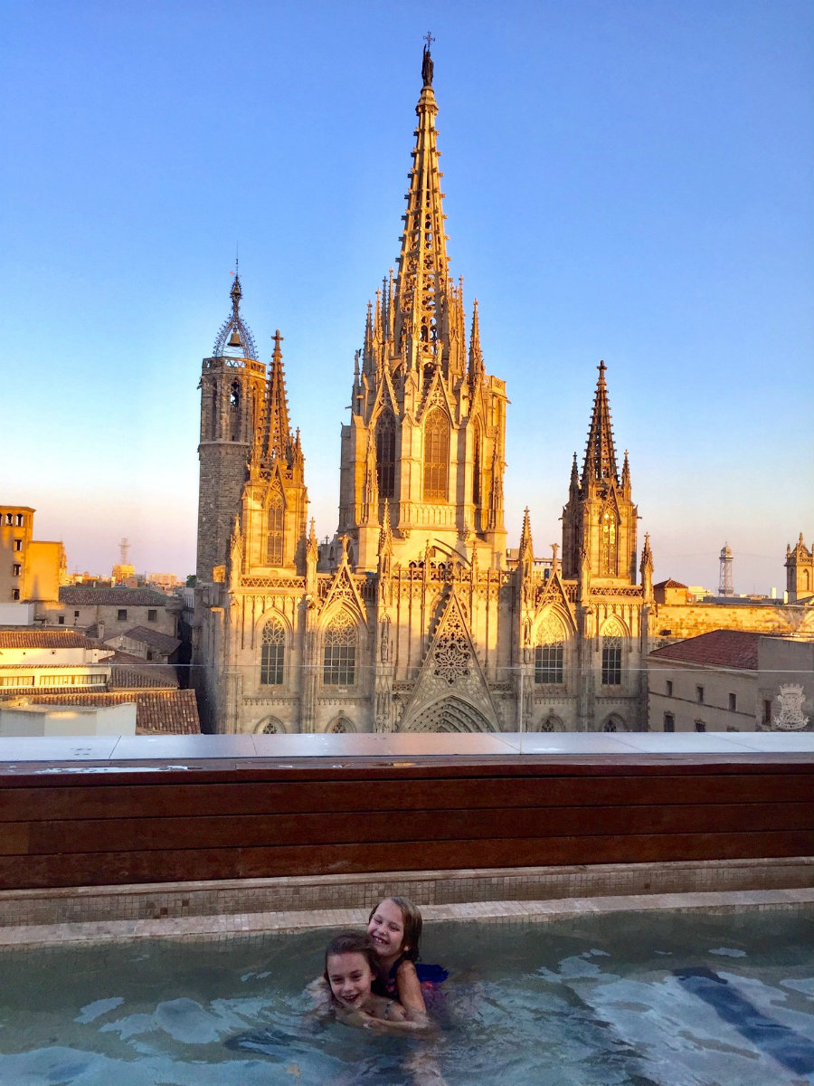 Swimming at our hotel rooftop next to the Barcelona cathedral.