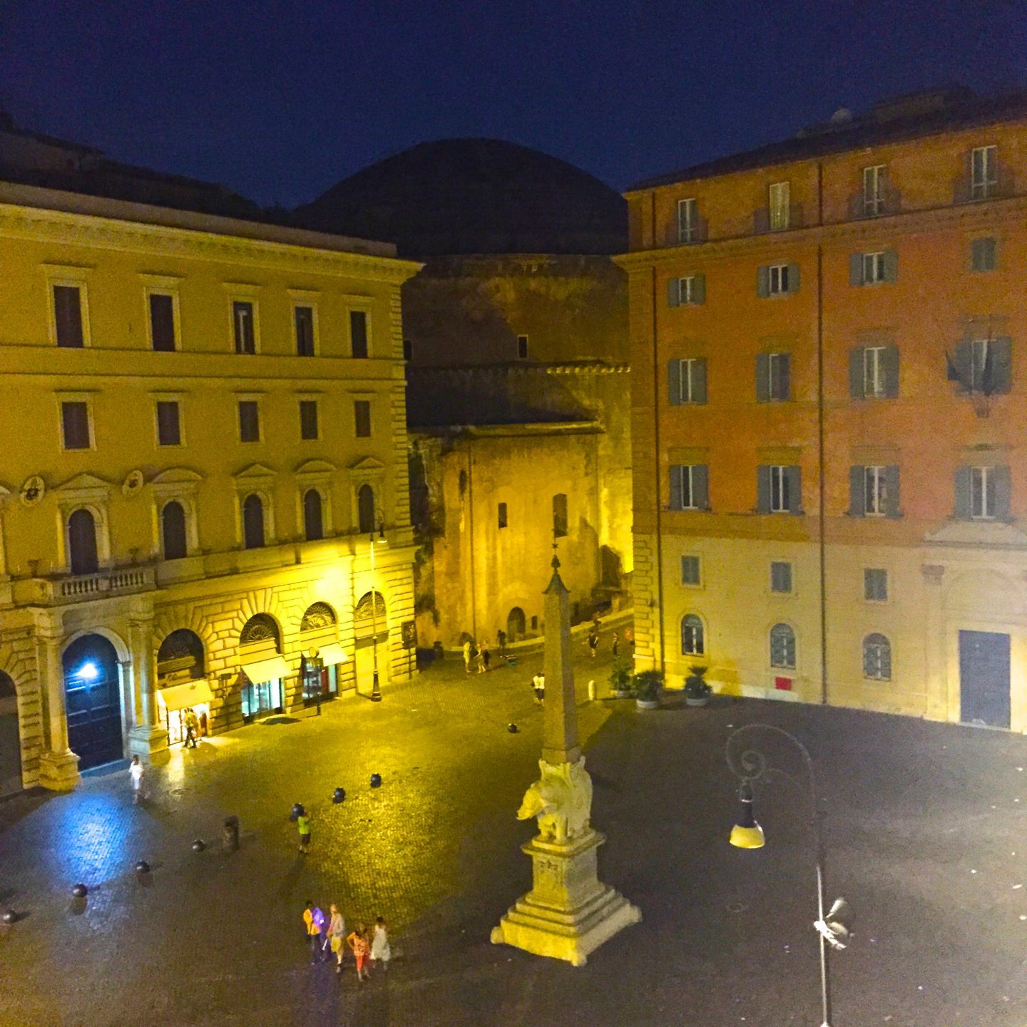 Playing in a Roman piazza at night.