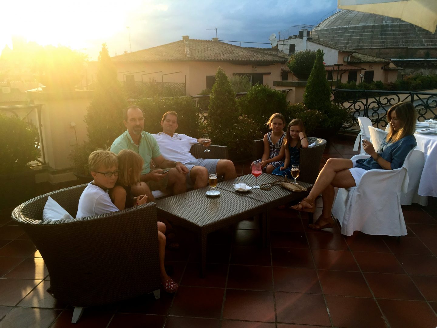 Sunset hour on a rooftop hotel in Rome.