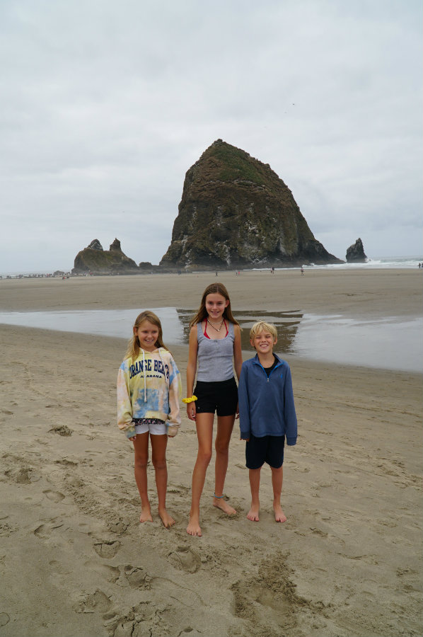 Kids exploring Haystack Rock