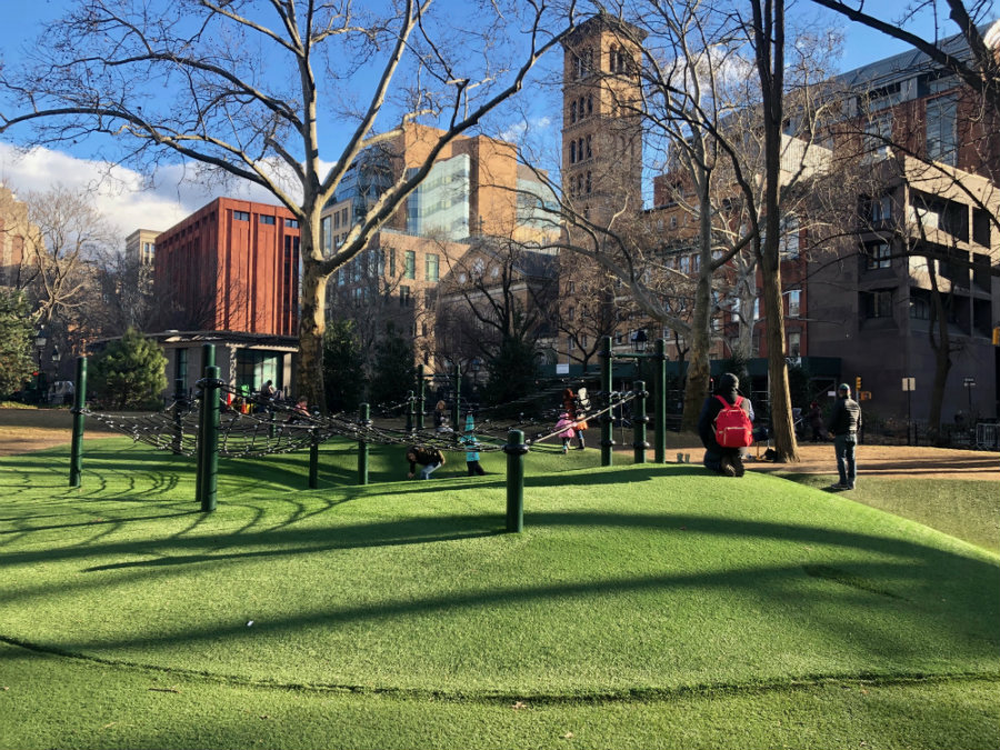 Playing in Washington Square Park in Greenwich Village in winter