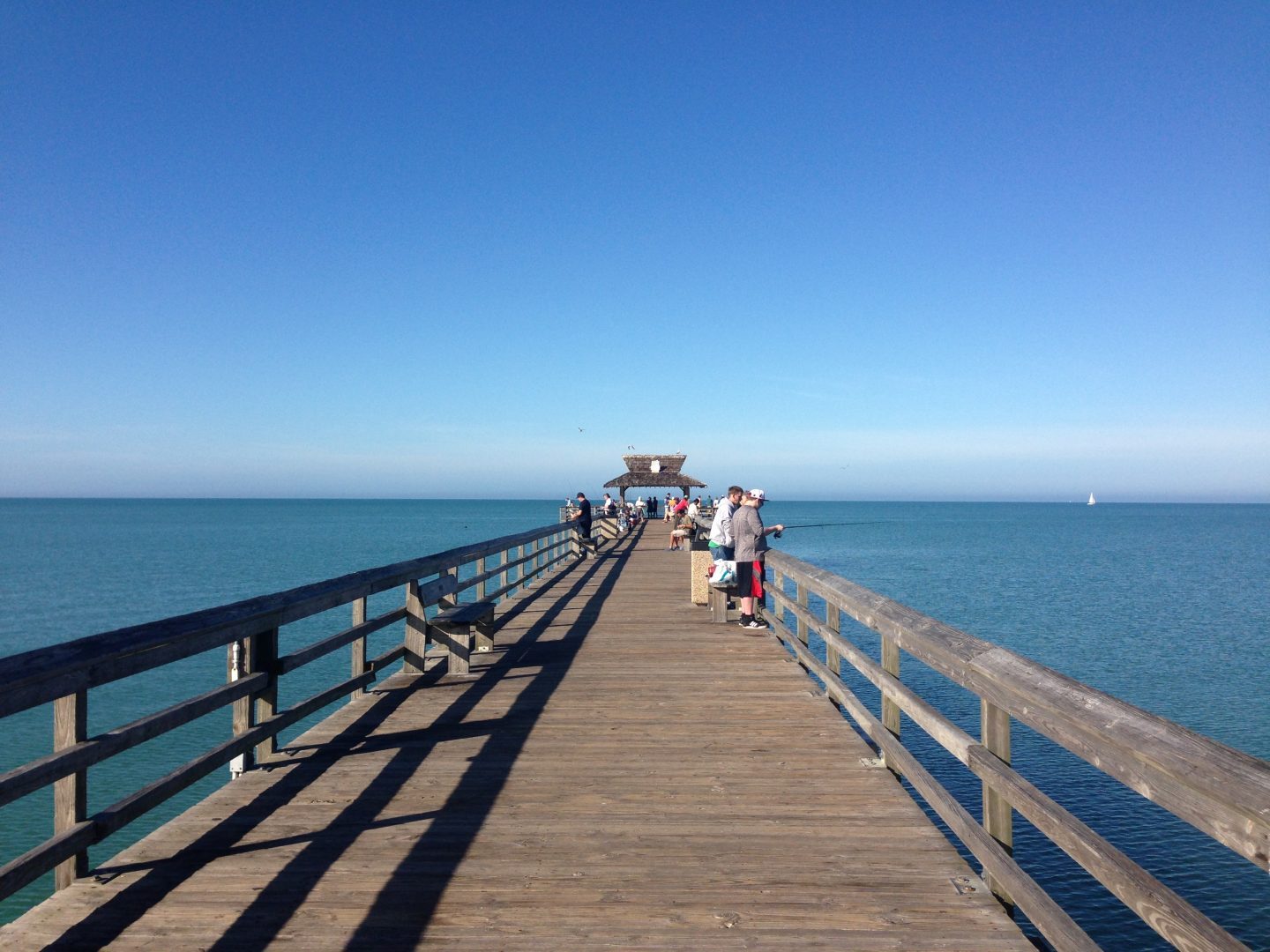 Walking on the town pier in Naples Florida.