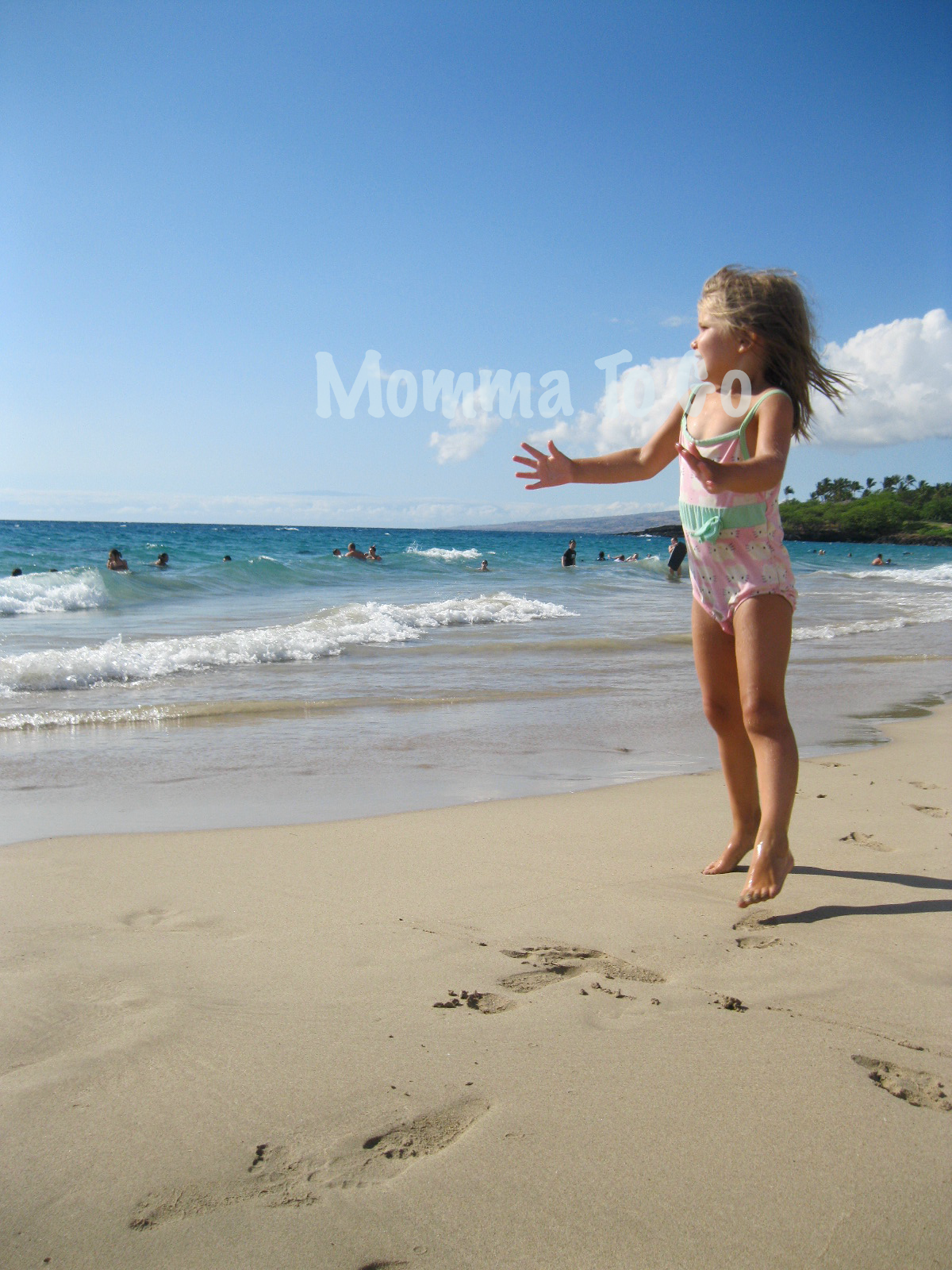 Playing on the beach in Hawaii.