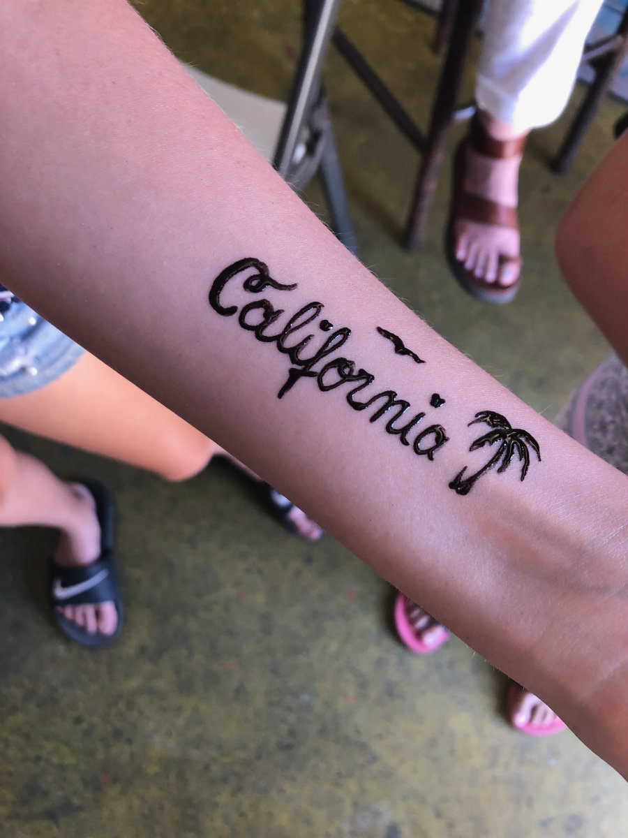 Venice Beach with kids, getting henna tatoos