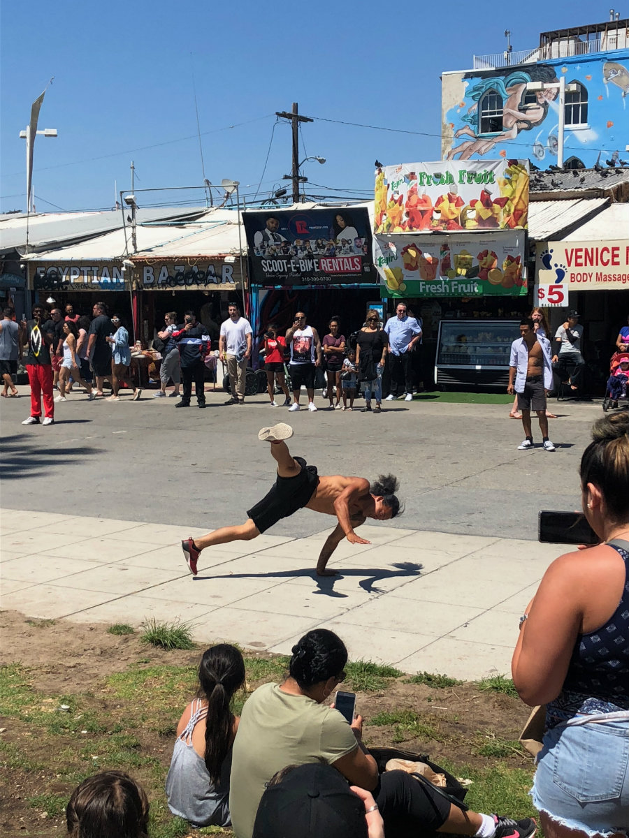 Watching the street performers and dancers on Venice Beach