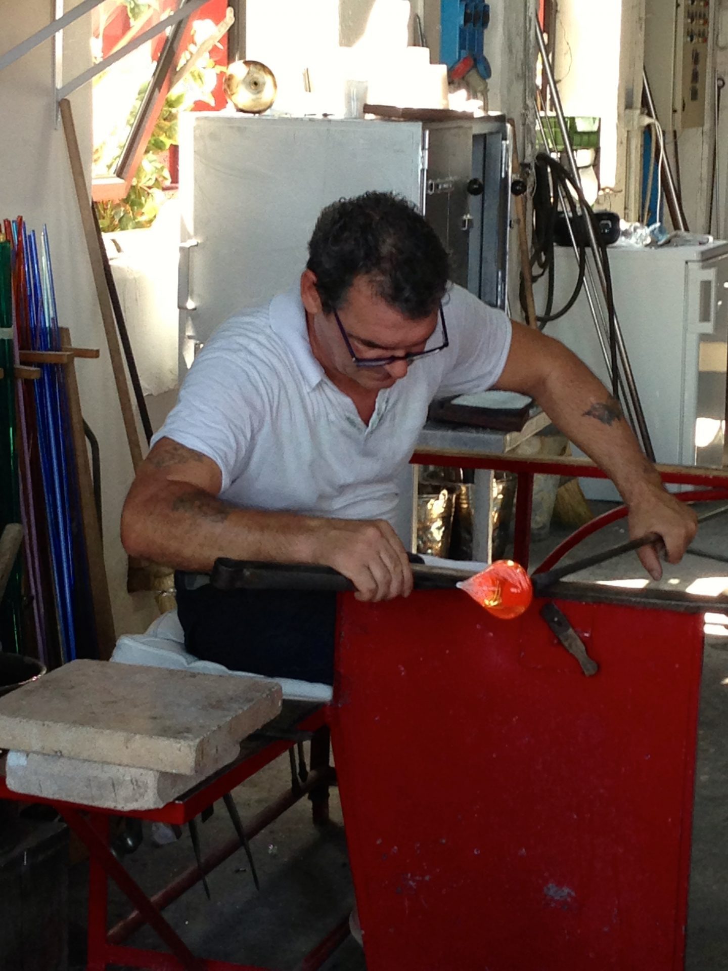 Watching the glass blowing in Murano,.