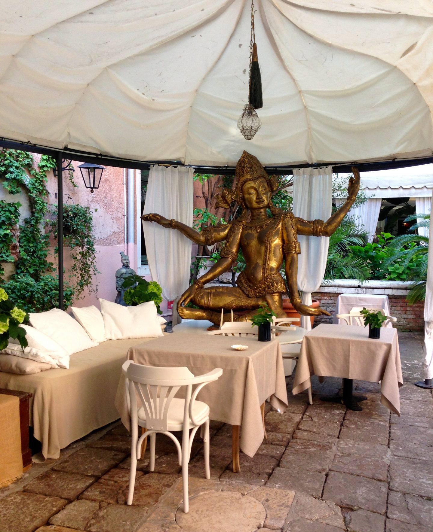 Eating breakfast in the courtyard of Hotel Metropole in Venice.