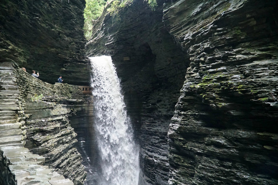 Walking behind the waterfall at Watkins Glen State Park