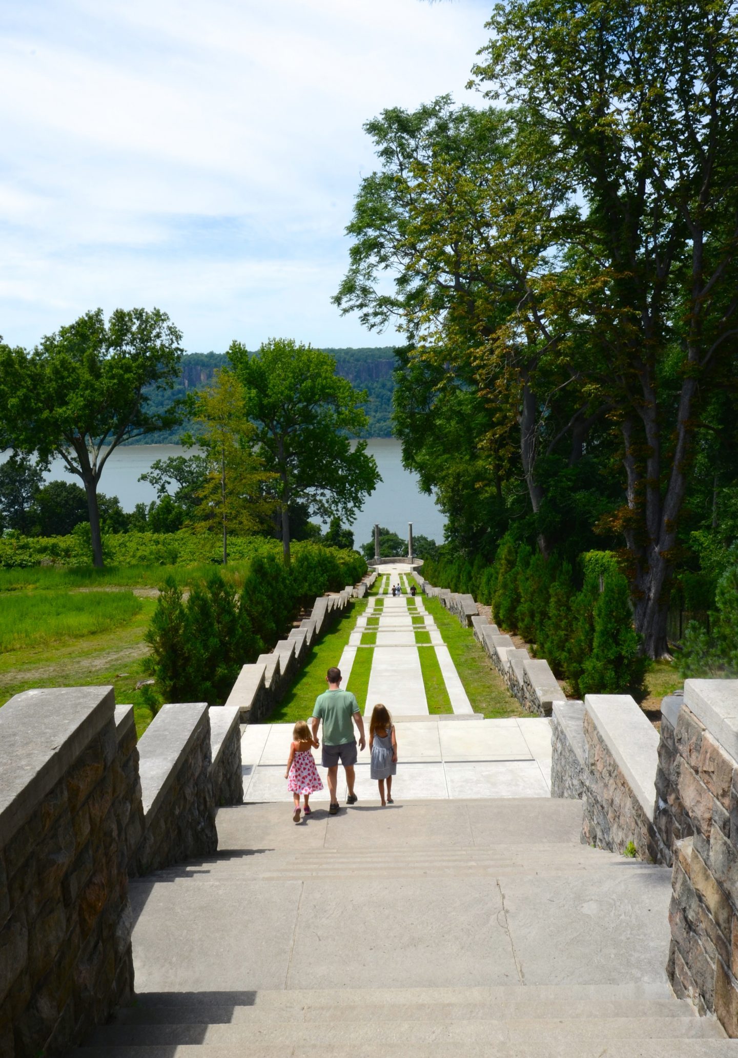 Walking down the grand staircase to the Hudson River at Untermyer Park and Gardens in Yonkers New York.