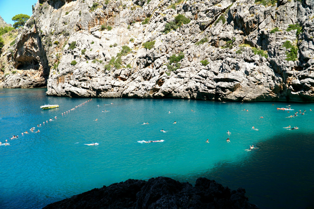 Swimming at Sa Calobra beach in Western Mallorca.