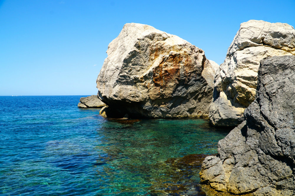 Swimming in coves in Western Mallorca.